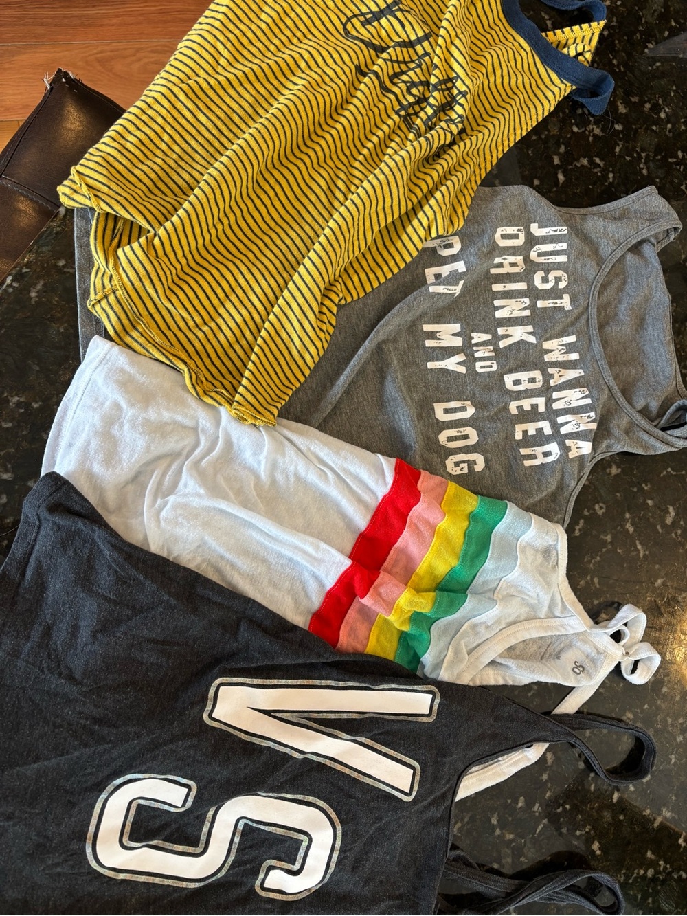 4 tank tops! Gently used